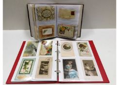 A vintage postcard album, mostly greetings cards,