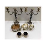 A pair of antique silver on copper candelabra twin