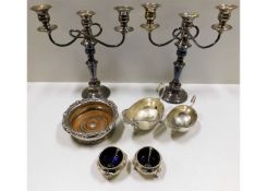 A pair of antique silver on copper candelabra twin