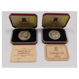 Two Poljoy Mint silver proof commemorative crowns: