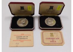 Two Poljoy Mint silver proof commemorative crowns: