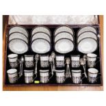 A cased set of 12 Cauldron porcelain coffee cans &
