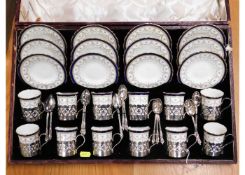 A cased set of 12 Cauldron porcelain coffee cans &