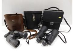 Two pairs of Hilkinson binoculars & an empty case