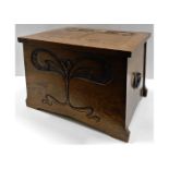 An oak art nouveau log box 20in wide x 14.5in deep
