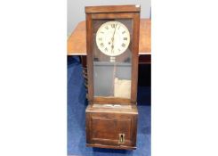 An oak cased Gledhill-Brook Time Recorder clocking