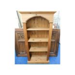 A pine book shelf 58.75in tall x 29in wide x 12in