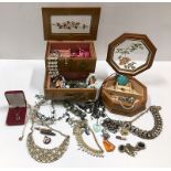A quantity of mixed costume jewellery & cases