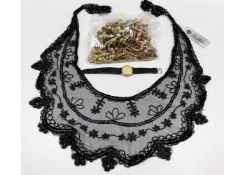 A ladies beaded mesh shawl twinned with a watch &