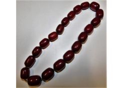A set of cherry amber style beads 64.4g, 16in long