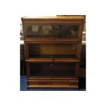 A three tier oak Globe Wernicke bookcase 34in wide