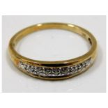 A 9ct gold ring set with small diamonds size Q/R 2