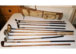 Ten hickory golf clubs including woods with case