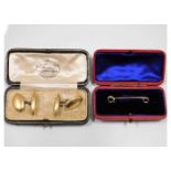 A pair of 18ct gold cufflinks 8.9g, dents to rear,