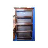 A four tier oak Globe Wernicke bookcase, lower two