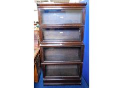 A four tier oak Globe Wernicke bookcase, lower two