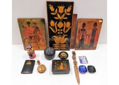 A Russian lacquer ware box twinned with other Russ