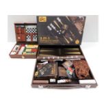 A boxed leather Backgammon & games set with a trav