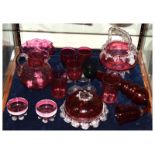 Selection of Victorian and later cranberry glass to include; a novelty pipe, basket, bowl, jug, pair