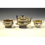 Victorian silver three piece tea set having gadrooned decoration, Sheffield 1893, height of teapot