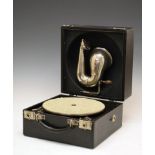 Decca portable wind-up trench model gramophone in black case having chrome amplifying horn to lid,