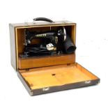 Singer '99K' model electric sewing machine with integral light, cased