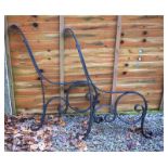 Pair of wrought iron scroll design bench ends