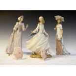 Three Lladro figures - Damita Vienesa, Damita Inglesa and Cenicienta, all standing approximately