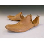 Pair of early to mid 20th Century wooden shoe lasts, Stubbs & Burt Ltd, Bristol with hinged heels,