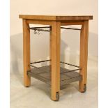 Modern kitchen preparation table or butchers block with metal undershelf on castors, 65cm wide