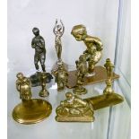 Small collection of novelty brass tampers, cast metal footballer etc