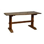 Antique pine and fruitwood plank top kitchen table raised on square end supports united by