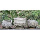 Three assorted garden pots comprising a pair of square form, 35cm wide x 31cm high, the third