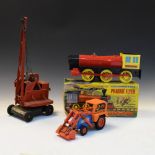 Vintage Triang red tin crane, together with JCB Digger and boxed vintage battery operated locomotive