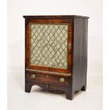 Antique rosewood cabinet having single brass lattice door with drawer below, 70.5cm wide