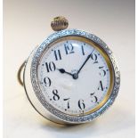 Early 20th Century silver-cased travel clock, the white Arabic dial inscribed 8-days, with top-wound
