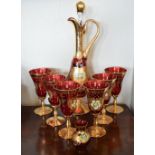 Italian Murano gilt and enamel decorated carafe and six wines and smaller vase