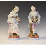 Pair of late 19th Century Continental porcelain figures of a lady and beau on circular plinths, 39cm