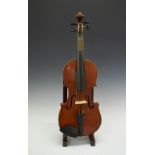 Violin with paper label stamped Made in Czechoslovakia, together with a bow stamped 'Vuillaume',