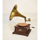 Table-top wind-up gramophone having brass horn