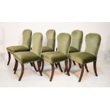 Six reproduction mahogany dining chairs upholstered in green plush