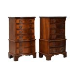 Pair of reproduction Georgian style mahogany serpentine front bedside chests, each fitted six