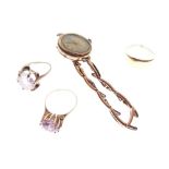 Two 9ct gold dress ring, each set purple-coloured stone, together with a lady's 9ct rose gold