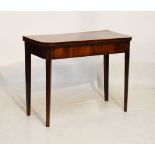 19th Century mahogany and string inlaid fold-over card table raised on square tapered supports, 52cm