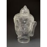 Moulded glass bust of a deity, 29cm high