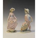 Two Lladro figurines, 'Little Gardener' 1283, 24.5cm high, and another girl with flowers (2)