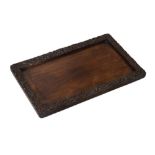 Oriental rectangular carved hardwood tea tray, the border decorated with dragons, 55.5cm x 35cm