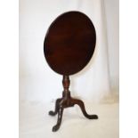 George III oak tilt top tripod table, 60cm diameter