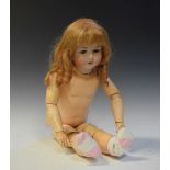 Early 20th Century Armand Marseille German bisque headed and corset bodied doll, marked 390 to