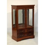 Mahogany finish display cabinet fitted two glazed doors with drawers below, 81cm wide